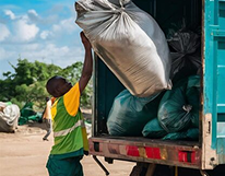 Waste collection crew operating roadside